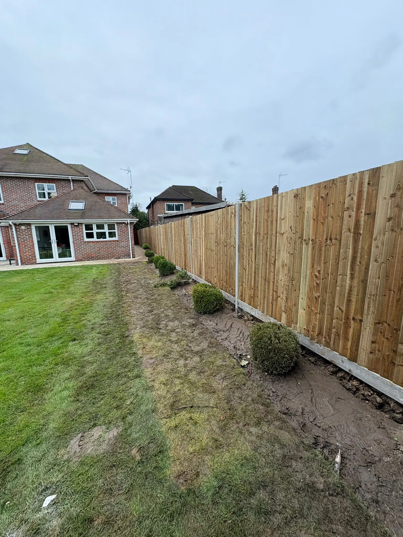 Full run of new closeboard fencing installed by GX Tree Care