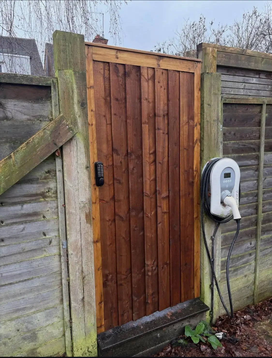 Bespoke timber side gate fitted alongside new closeboard fencing